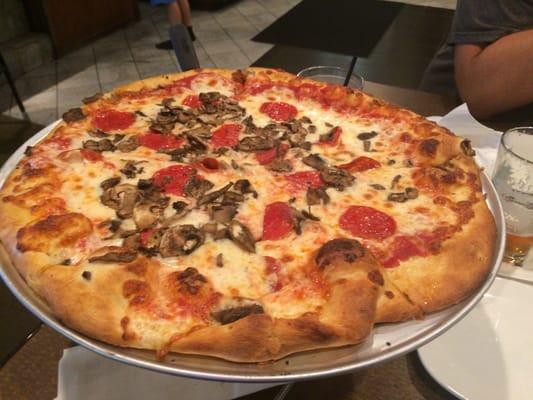 Pizza: Pepperoni and mushroom.