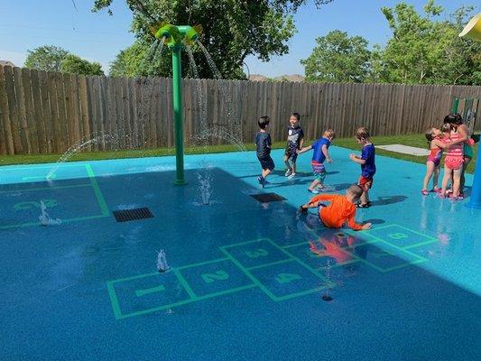 Playing outside on a beautiful day in our awesome water park!