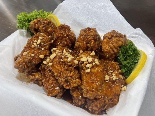 Korean chicken wing, hand battered, King's magic sauce 10pcs special with house salad only, $11.99 must try.!