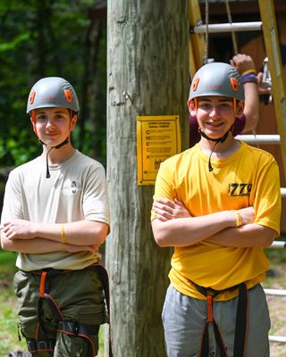 Scouts ready to concur the zip line.