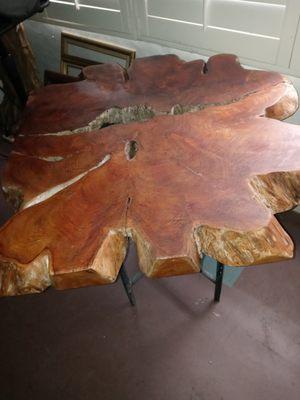 Live edge juniper tree slab made into a table