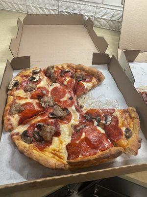 Pepperoni, mushroom and sausage pizza