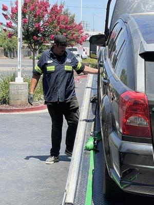 Austin towing my grandsons car.