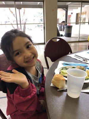 Izabella enjoys one of many brunches that the Church of the Brethern offers to their congregation.