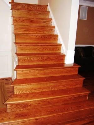 This staircase was carpeted. We installed Red Oak hardwood treads & risers on this staircase.