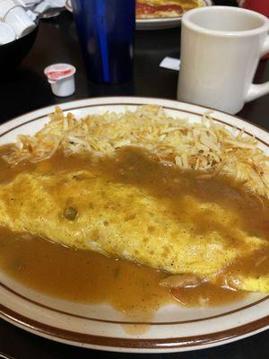 Green Chili Smothered Omelet and hash browns