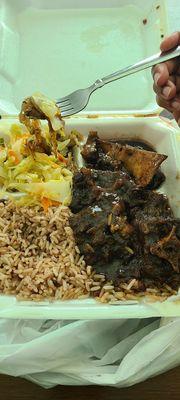 Large Oxtail plate with rice & peas and cabbage.