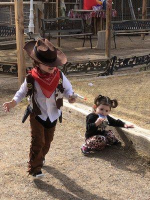 My babies having the time of their life! My son HAD to dress like a cowboy lol