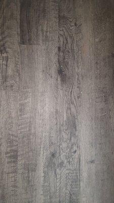 Aged Greay Wood Laminate. They call it "Peppercorn" and we call it Awesome