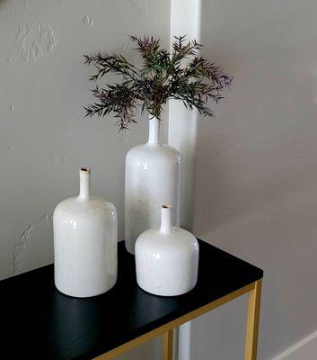 Trio of vases and greenery