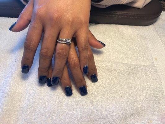 A fellow customer chose a dark inky blue on rounded square nails