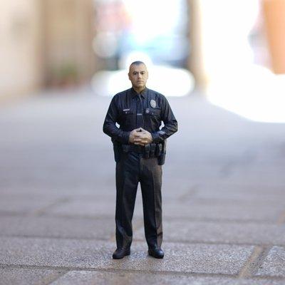 3d printed figure of local officer. Contact us for 3d printing and scanning needs.