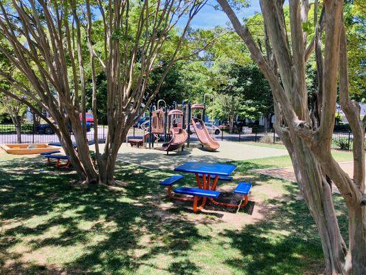 Playground for toddlers, fenced in too.