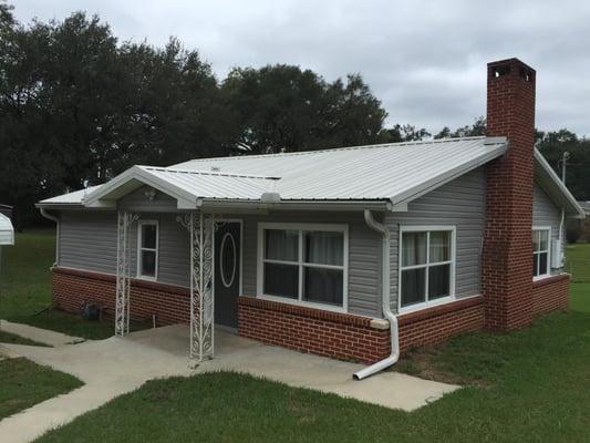 Sweet cottage on one full acre. 2 bed 1 1/2 bath, newly remodeled, hard floors, large utility room and so much more...