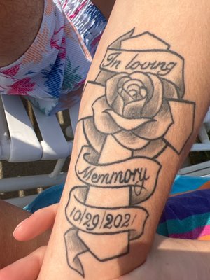 Tattoo with the wrong spelling of "memory." Spelt "memmory"