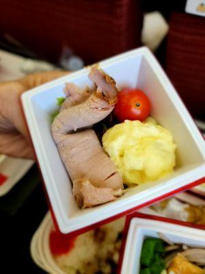 Potato salad and roast beef side dish