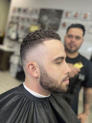 Jose giving a low fade