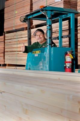 Hector assisting Customers in  the Lumber Yard