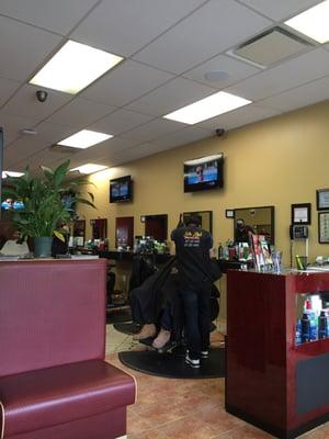 Clean and friendly. 8 flat screen TV's, cool Latin music playing. I had Asmir cut my hair in a new style. A midway fade combover. I love it!