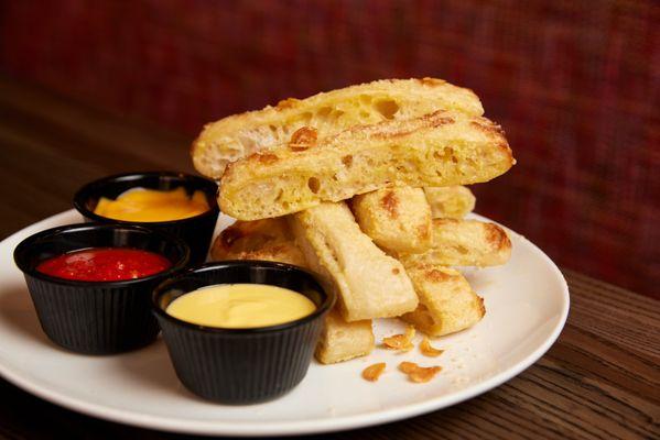 Breadstick with your choice of Marinara | Cheese Sauce | Garlic Butter