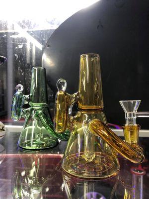 beautiful colorful bongs available for purchase at discounted prices every single day! come visit us for all of your smoking needs!