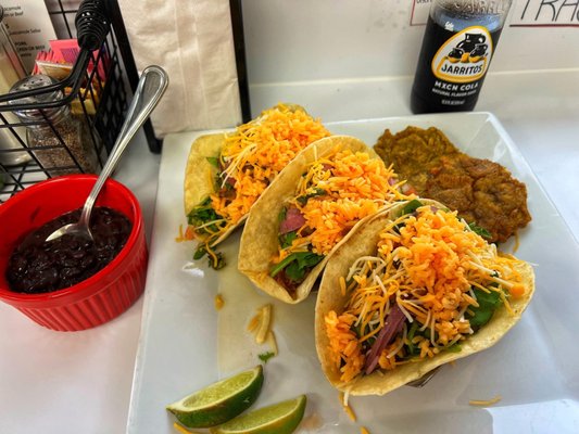 Pernil tacos w/ fried plantains and black beans