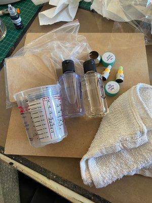 Kit with bar towel and tiny sizes of product