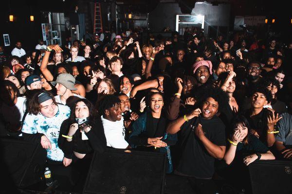 Photo taken of crowd at a concert for the artist "Lucki"