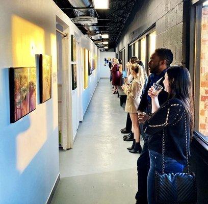 Visitors at Art on Main Gallery.