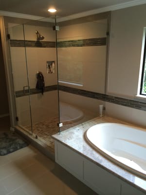 Drop-In Tub with Marble Top, Walk-In Frameless Shower, Heated Floors