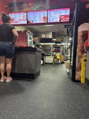 She's waiting on a DoorDash order and tried to pick up another one while she was here and is being told the order isn't here...