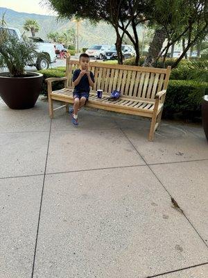 My son enjoying his Pepperoni Pretzel Nuggets and his frozen lemonade