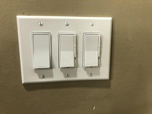 Dimmable rocker switches for recessed LED lighting