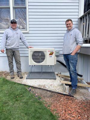 Matt and Mitch installing a high-efficient Mitsubishi ductless mini-split hyper heat system.