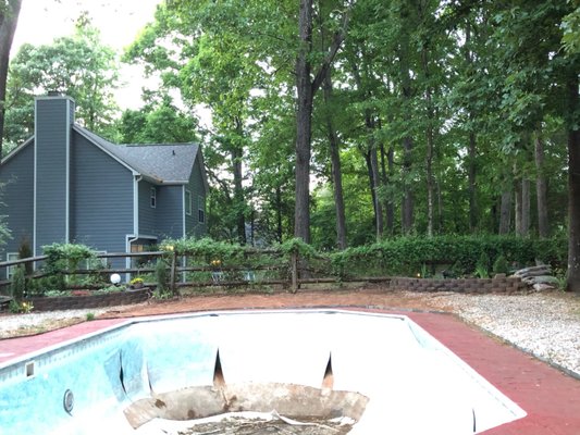 Found out fallen tree branch broke liner and fence after removing pool cover.