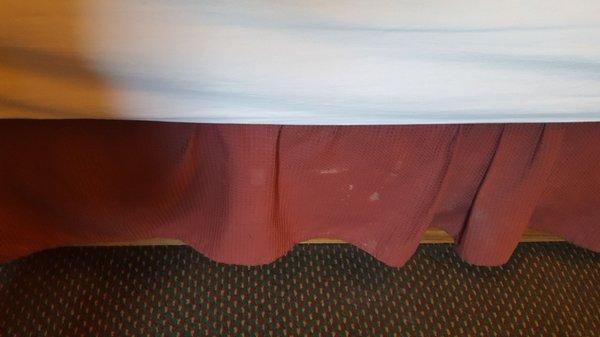 Don't know what on bed skirt. But I don't think it was washed in a long time.