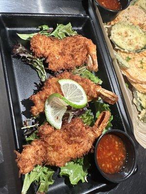 Large coconut shrimp served with sweet chili glaze