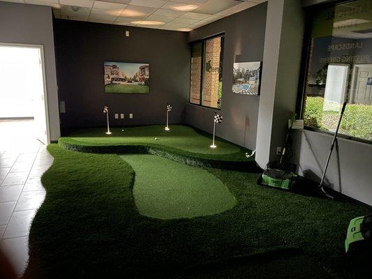 Showroom raised putting green with LED lit golf holes