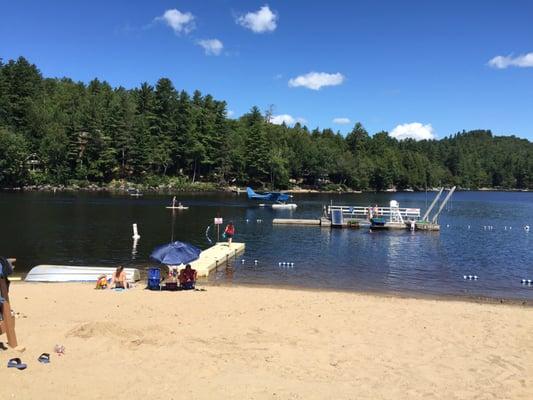 Beach/swimming area at Long Lake. Sea planes taking off and landing through out the day.