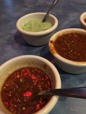 Three salsas. The closest one was quite spicy.