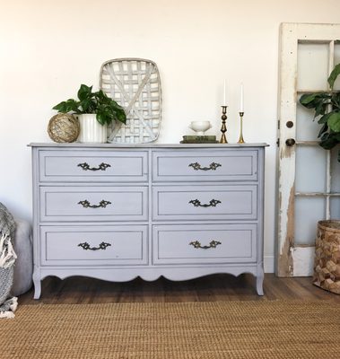 This charming French Provincial style dresser will add a touch of glamour to any bedroom or space in your home.