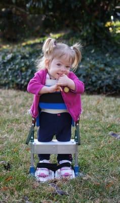 Autumn looking precious in her custom designed standing frame.