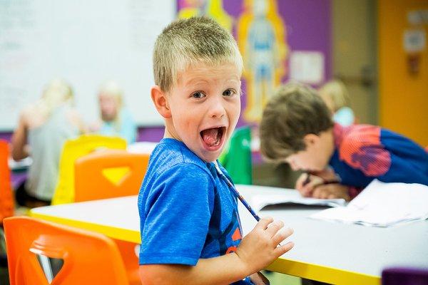 Children listening in classroom.