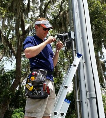 Ryan repairing CCTV connection.