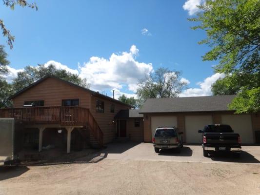 GAF Timberline HD reroof, cedar siding staining, fascia, and guttering