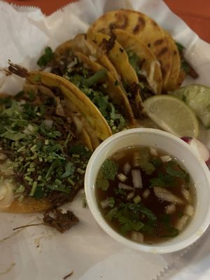 Birria tacos with consome