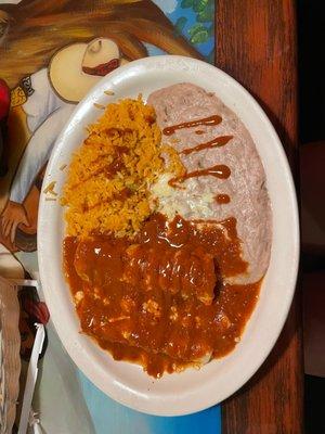 2 beef enchiladas with rice and beans (Valentino sauce on top)