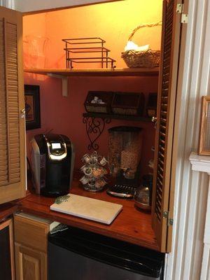 The "breakfast cabinet" that contains the keurig and cereal. Choices are limited.