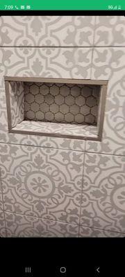 Tile job interior bathroom with soap dish