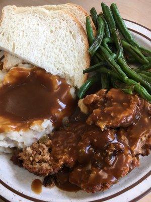 Meatloaf lunch special with mashed potatoes with gravy and green beans!